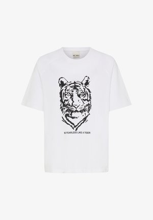 Witte katoenen t-shirt met een zwart tijgerafbeelding op de voorkant en de tekst "WEES ONVERSCHROKKE DUS ALS EEN TIJGER" eronder. Korte mouwen, relaxed fit.