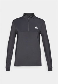 Must samuti eemaldatav kaelustega, must, pika varrukaga spordipusa tekstuurse kangaga ja väikese logoga vasakul ülal rinnal.