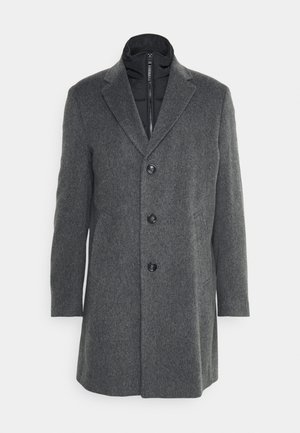 Manteau en mélange de laine gris avec un col à revers, fermeture à trois boutons, deux poches latérales et doublure intérieure zippée.