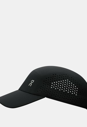 Black cap with a curved visor, featuring perforated design on the side for ventilation and a logo on the front. Made from lightweight material.