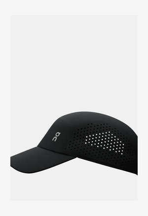 Black cap with a curved visor, featuring perforated design on the side for ventilation and a logo on the front. Made from lightweight material.