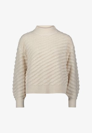 Beżowy sweter wykonany na drutach z wysokim żeberkowym kołnierzem, ukośnym teksturowanym wzorem, długimi bufkami i żeberkowymi mankietami oraz dołem.