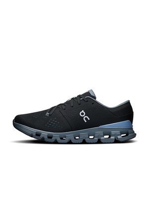 Black and gray lightweight running shoe with cushioned segmented sole and lace-up closure, featuring a small white On logo on the side.