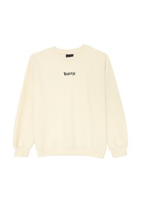 Maglione crema realizzato in tessuto morbido, con collo rotondo, maniche lunghe e un piccolo testo nero "DISCLAIMER" sul petto.