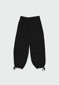 Pantalon noir à cordon avec une coupe décontractée, doté de poignets élastiqués et de deux grandes poches avant. Confectionné en tissu léger.