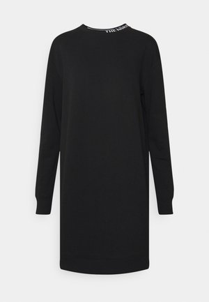 Vestido tipo sudadera negro de manga larga con cuello redondo, puños y cuello acanalados, con texto parcial blanco "THE NORTH" en el cuello.