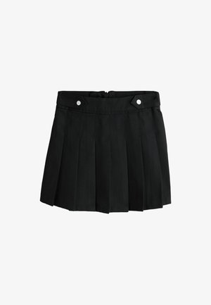 Jupe plissée noire avec deux détails de boutons métalliques à la taille, conçue avec une taille haute et une longueur courte.
