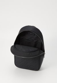 Tommy Hilfiger MONOGRAM SLING BAG - Bum bag - black
