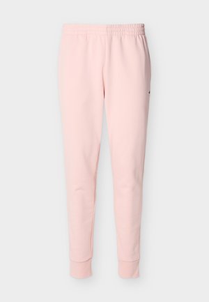 Ροζ ανοιχτό ρεγκλάν παντελόνι φόρμας με ελαστική μέση και μανσέτες, με μικρό κεντημένο λογότυπο στο δεξί μηρό.