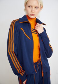 adidas Originals MONTREAL  - Camisola com fecho - night indigo