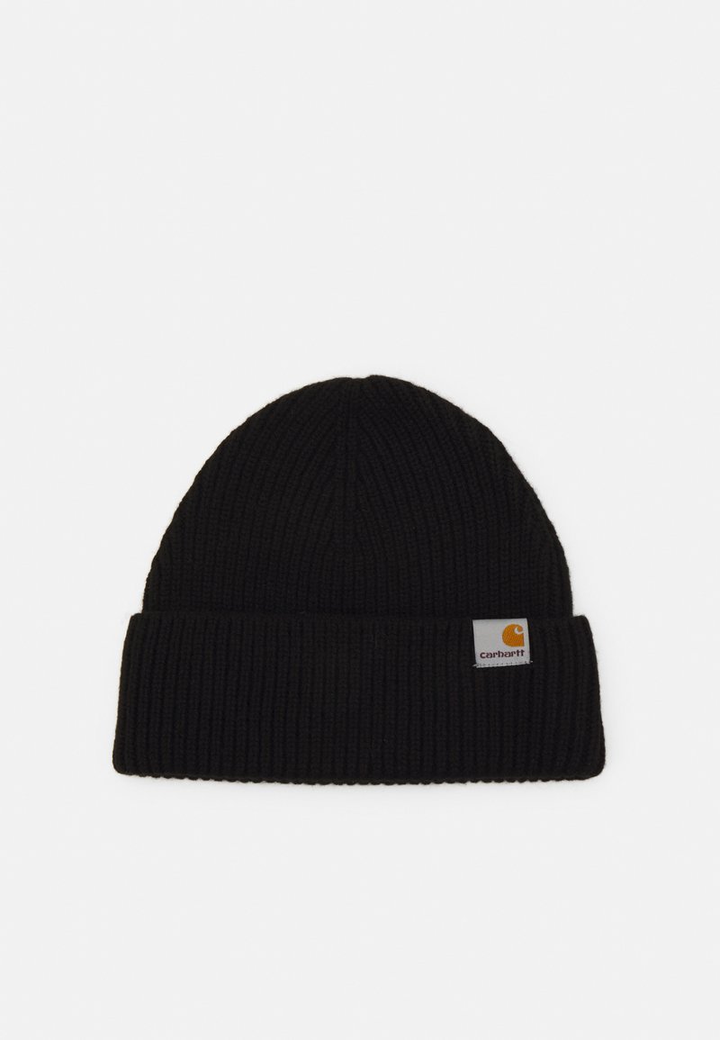 Black knitted beanie hat with a ribbed texture and a rolled cuff. Features a small rectangular brand label in orange and white on the side.