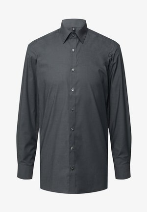 Tumehall pikkade varrukatega nööpidega särgis, millel on struktureeritud krael, esine nööbid ja sile tekstuur. Hästi vastav lõige ja täielikud varrukad.