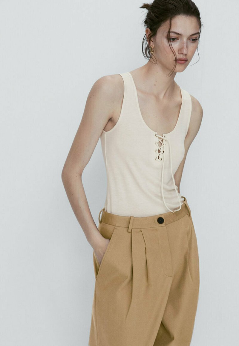 Massimo Dutti SLEEVELESS WITH LACEUP NECKLINE Top beige Zalando.at