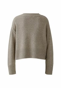 Beige cropped trui met geribbelde zoom en mouwen, textuur gebreid patroon en een subtiele ronde detail op de achterkant van de nek.