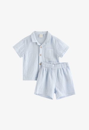 Light blue short-sleeve button-up shirt with chest pocket and matching elastic waist shorts, both in textured lightweight fabric.