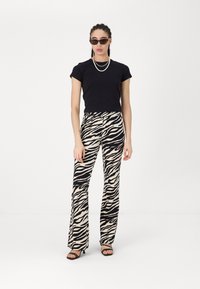 Noisy May NMDESTINY FLARED PANTS  - Hlače - black