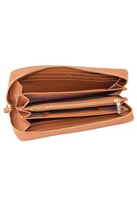 Tan leather wallet with a zip closure, featuring multiple compartments, card slots, and a smooth interior lining. Golden zipper accents.