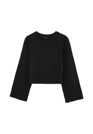 Felpa nera corta con maniche lunghe, caratterizzata da dettagli in pizzo di maglia testurizzata sui polsini. Realizzata in morbido cotone.
