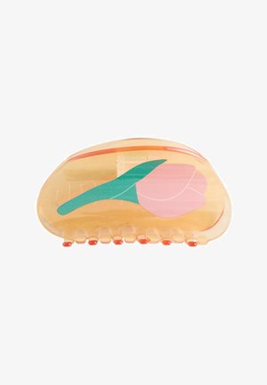 Translucent orange hair claw clip with a pink and green tulip design on one side.