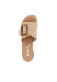 Beige suede slide sandal with a wide strap, featuring a wooden buckle. Soft insole with printed brand name "remonte soft." Flat sole.