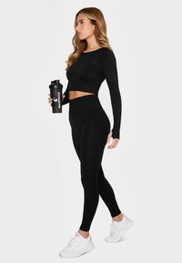 SQUATPROOF PURPOUSE - Longsleeve - black