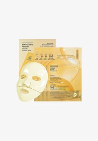 Hydrogel ansiktsmaskset i gul förpackning. Inkluderar steg 1 och steg 2, med en mask som har ögon- och munöppningar samt metalliska detaljer.