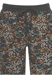 Pantalones jogger negros con cintura ajustable. Presentan un patrón de flores multicolores y una textura suave. Hechos de tela ligera.