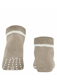 Brązowe skarpetki z miękkim, teksturowanym mankietem, z białym prążkowanym paskiem i gumowymi punktami antypoślizgowymi na podeszwach dla lepszej przyczepności.