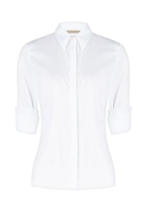 Camicetta bianca con colletto a punta, maniche arrotolate e una texture liscia. Nessun motivo o accento presente. Design classico.
