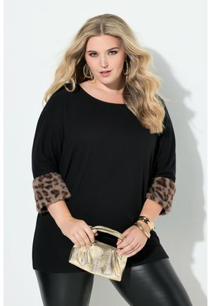- Sweter