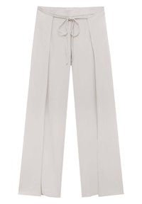 Ljust beige vida byxor med sprund i nederkant och dragsko i midjan.