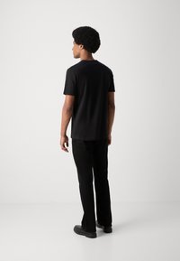 Antony Morato REGULAR FIT FLOCK PRINT - Majica kratkih rukava s printom - black