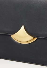 sessùn DIVILUZ - Borsa a tracolla - black