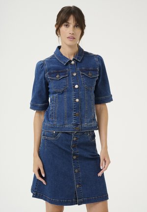 Denim jacket, short sleeves, two chest pockets, and button closure. Paired with a matching denim skirt featuring front buttons and pockets.