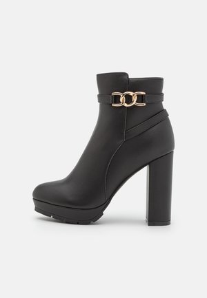 Bottines à talons hauts - black