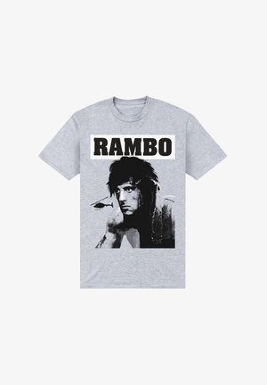 Szara bawełniana koszulka z czarno-białym graficznym wizerunkiem twarzy postaci oraz helikoptera, z wyraźnym napisem "RAMBO" powyżej.