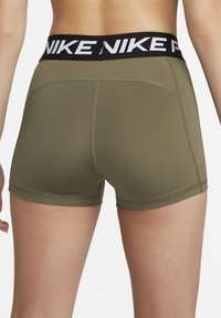 Nike Performance SHORT - Leggings - medium olive/black/white