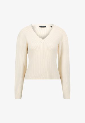 Sweter w serek z długim rękawem w jasnym beżowym kolorze z prążkowaną fakturą i perłowymi ozdobami wzdłuż dekoltu. Krótkie dopasowanie, wykonany z miękkiego materiału.