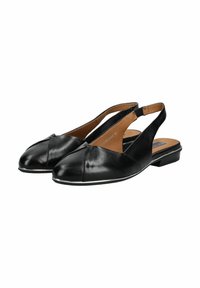 Bailarinas de cuero negro con diseño de crisscross en la punta y un tacón bajo rectangular con un acabado suave.