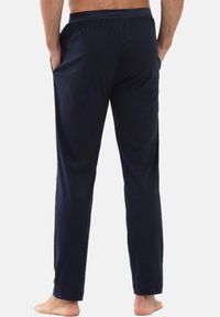 Navy katoenen loungebroeken met een elastische tailleband, zijzakken, rechte pijpen en een zachte textuur, geschikt voor casual wear.
