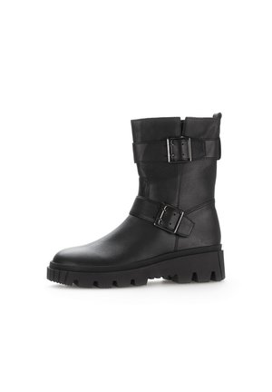 Black leather ankle boot with two buckles, textured upper, rounded toe, and a rugged, chunky sole featuring deep treads.