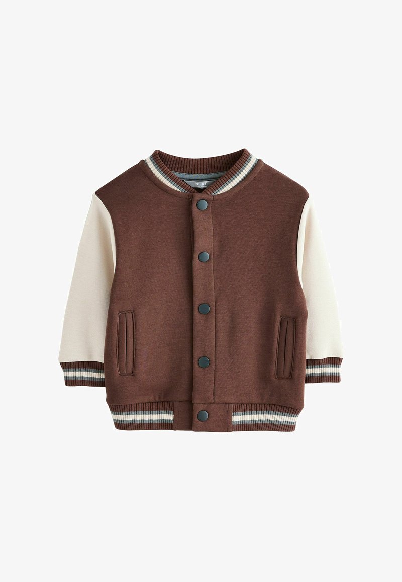 Brown and cream bomber jacket with ribbed collar, cuffs, and waistband. Features two side pockets and black snap buttons.