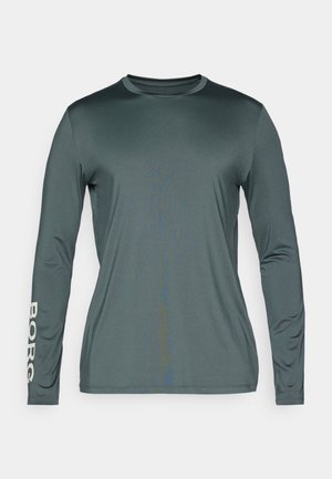 Koszulka sportowa z długim rękawem w ciemnozielonym kolorze, wykonana z gładkiego, oddychającego materiału. Posiada białe napisy "BORG" na lewym rękawie.