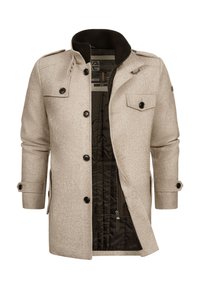 Veste beige en mélange de laine avec un col noir, une fermeture boutonnée à l'avant et deux poches poitrine. Comprend une poche intérieure zippée et un tissu texturé.