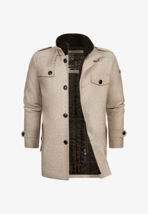 Beige jakke i ullblanding med svart krage, knappet front og to brystlommer. Har en glidelåslomme på innsiden og teksturert stoff.