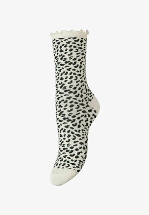 Calcetines blancos con estampado de leopardo negro, diseño acanalado en la parte superior y borde ondulado. Fabricados con un material suave y elástico.
