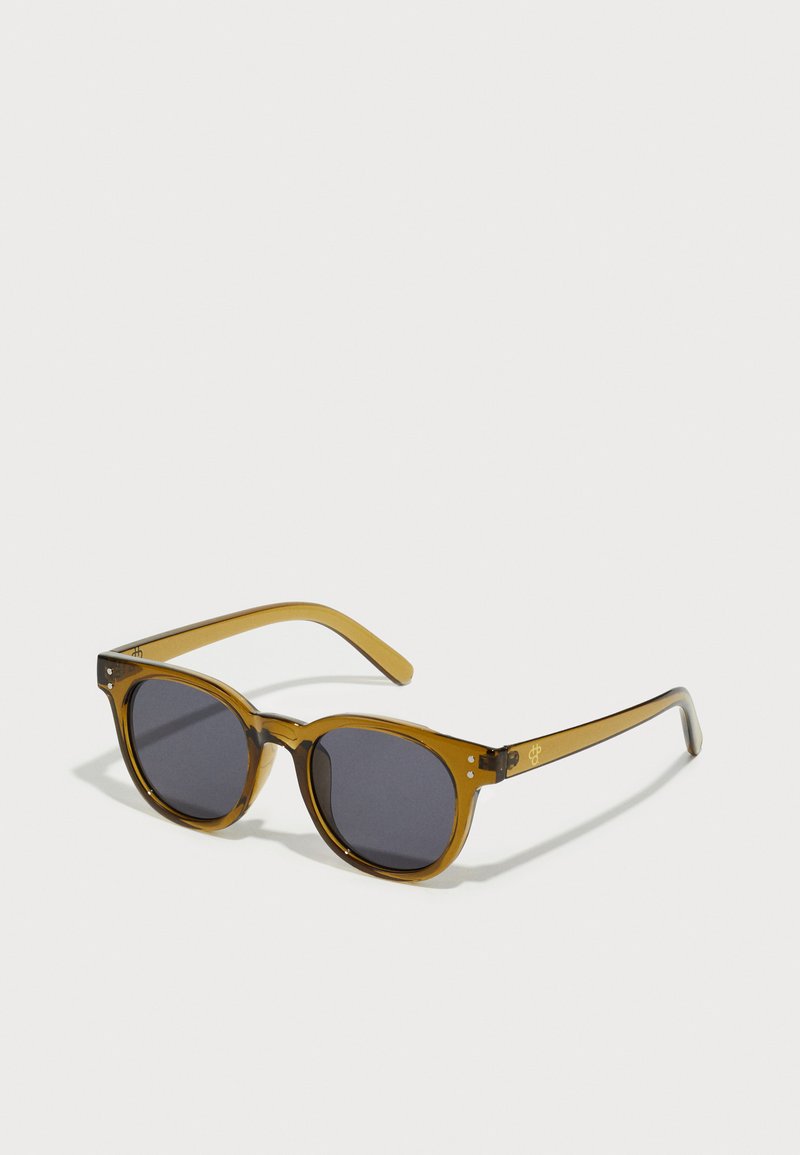 Brown-tinted sunglasses with square frames, dark lenses, semi-transparent arms, and subtle logo accents on the temples.