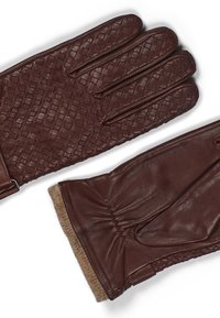 Brune skinnhansker med et vevet mønster på baksiden, glatt tekstur på håndflatene, og strikket mansjett for ekstra varme og komfort.