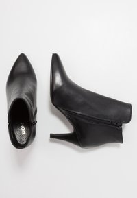 KIOMI Stövletter - black