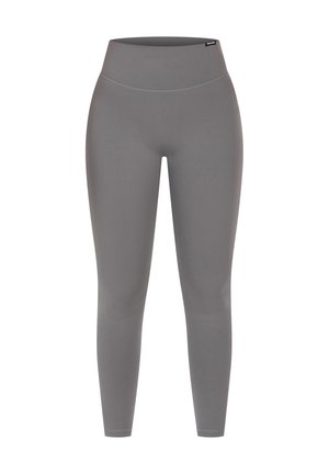 Leggings grigi alti in vita con una texture liscia. Progettati per una vestibilità aderente con una silhouette a lunghezza intera e senza motivi o accessori visibili.